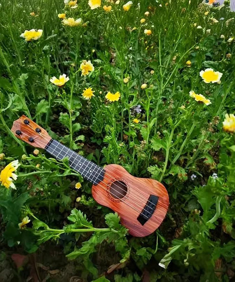 Mini Wooden Finish Plastic Guitar Music Instrument with 4 strings Clear sound