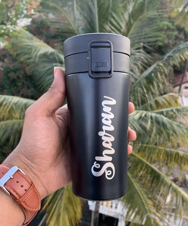 Customized travel mug.