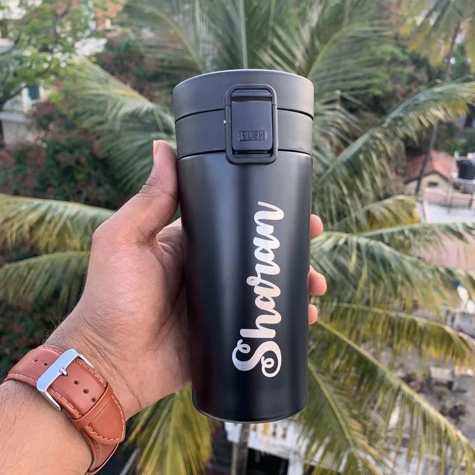 Customized travel mug.