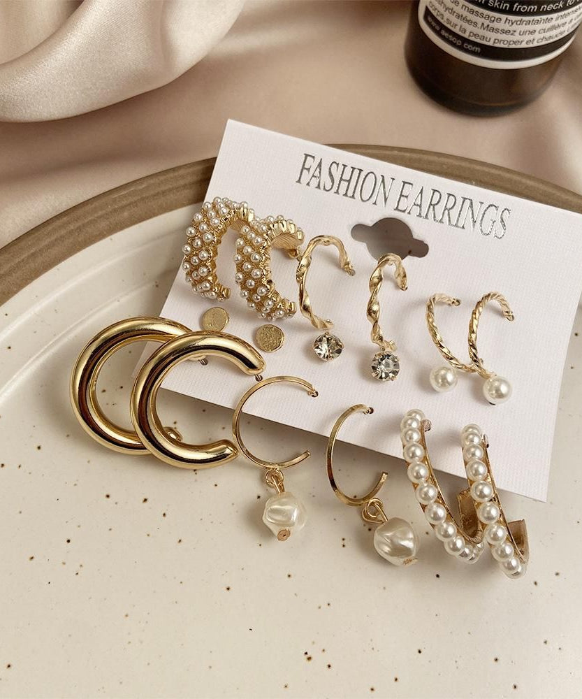 AVR JEWELS Combo Of 9 Stunning Gold Plated Pearl Studs and Hoop Earrings